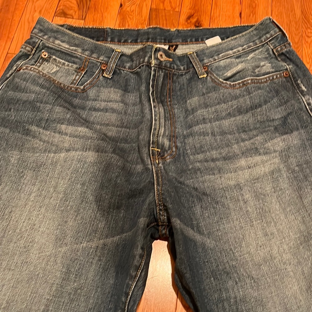 Men’s Lucy brand regular inseam size 38 jeans.